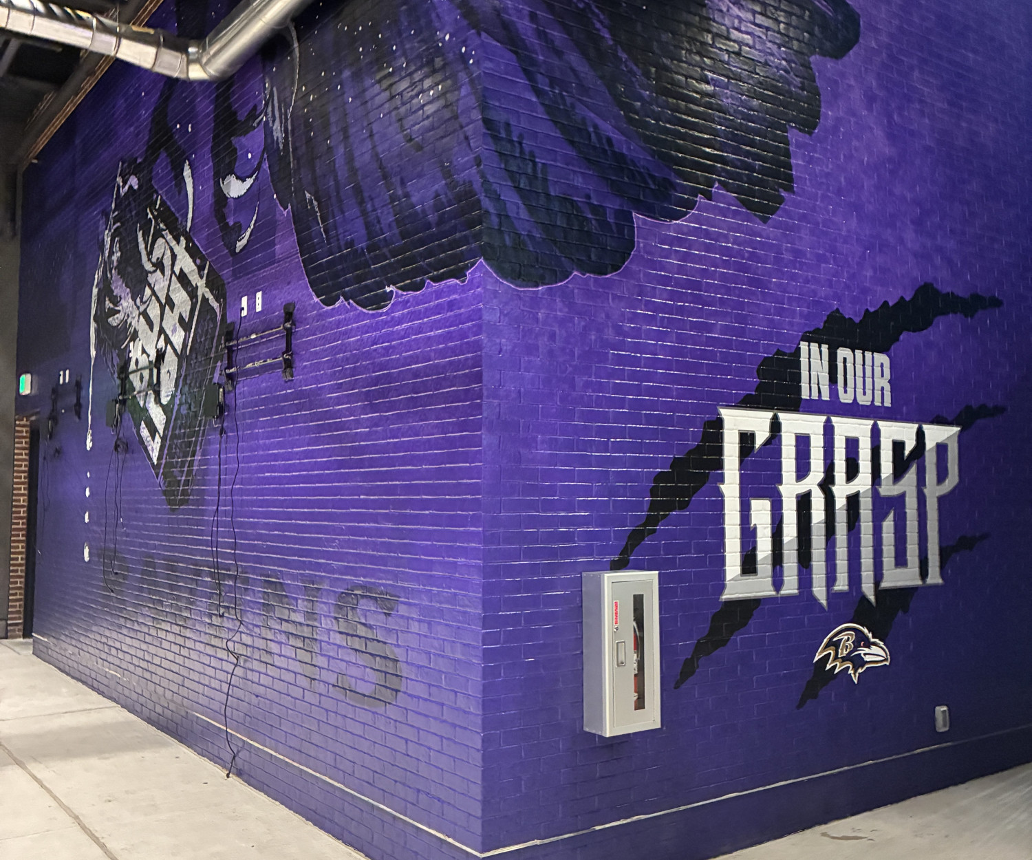 Baltimore Raven's stadium Bud Light Talon brick wall graphics.